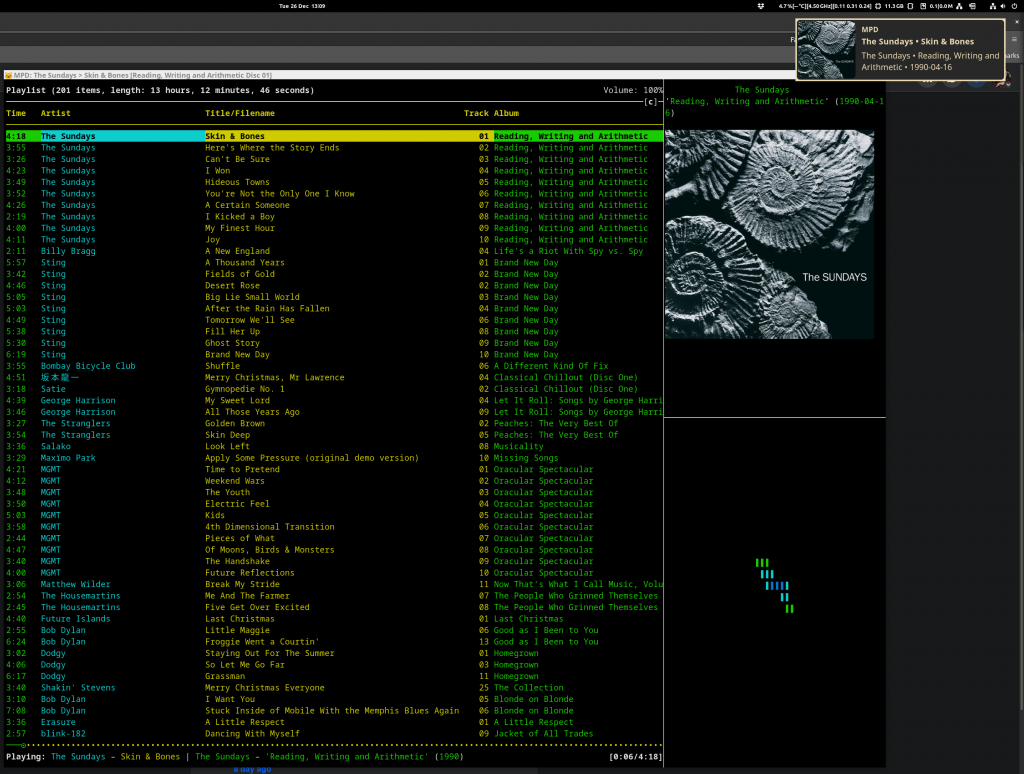 A screenshot of my ncmpcpp setup running in a kitty terminal, with a track change notification visible in the top right corner